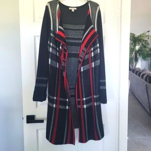 Sweater tunic. Black, gray, white, with red trim size Lg